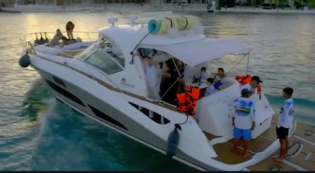Guests in the cockpit at sunset in Cancún