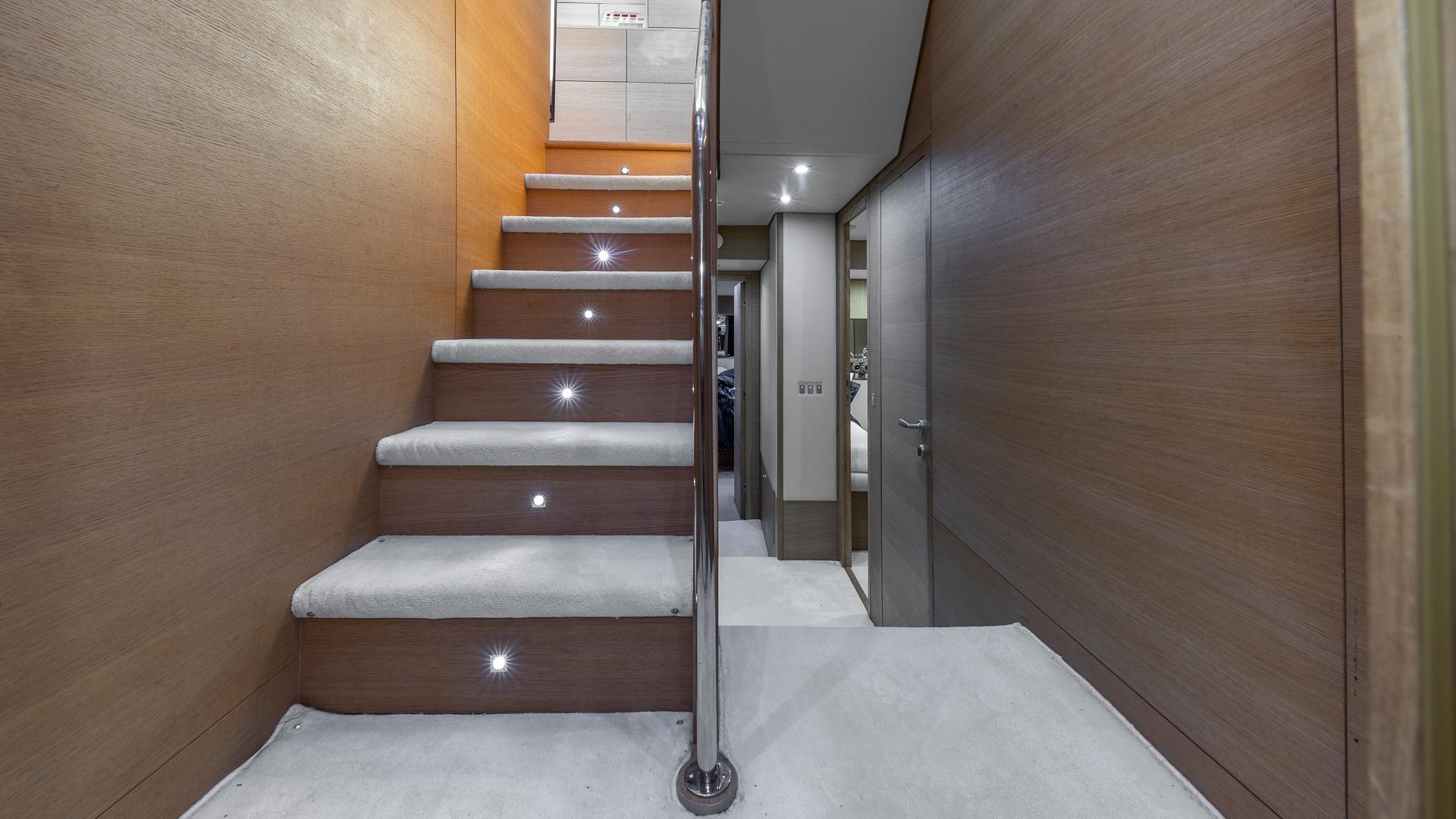 Luxury interior lit staircase Aicon 75 Therapy Miami charter