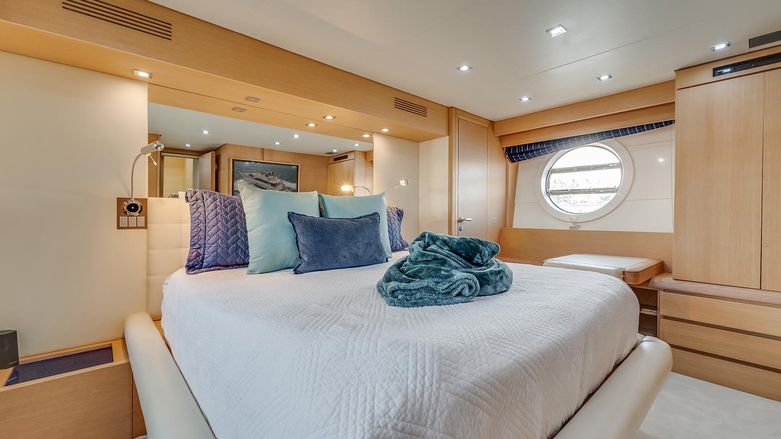 Master cabin king bed luxury Aicon 75 Therapy Miami yacht charter