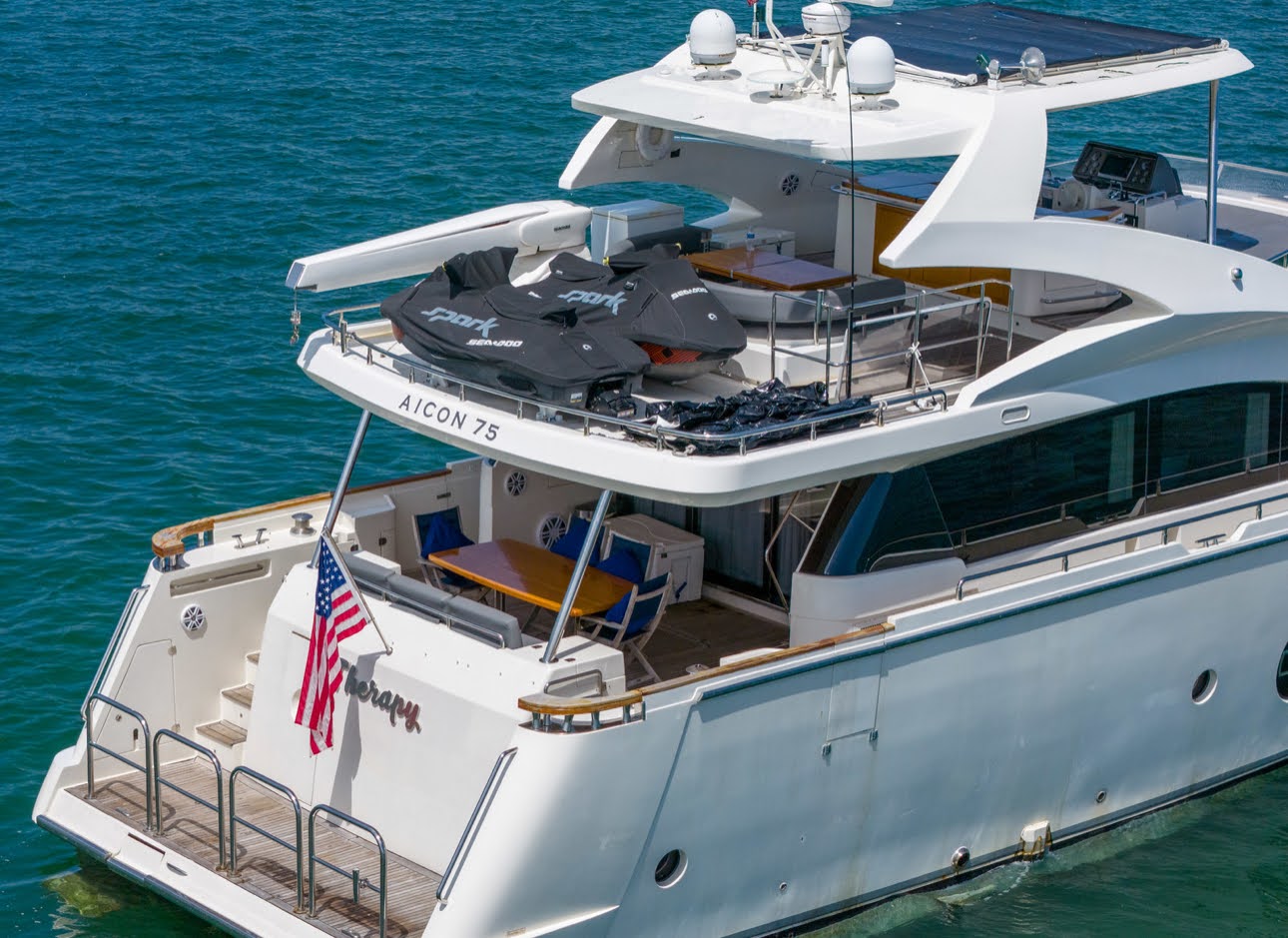 Aicon 75 Therapy stern with jet ski aerial Miami charter