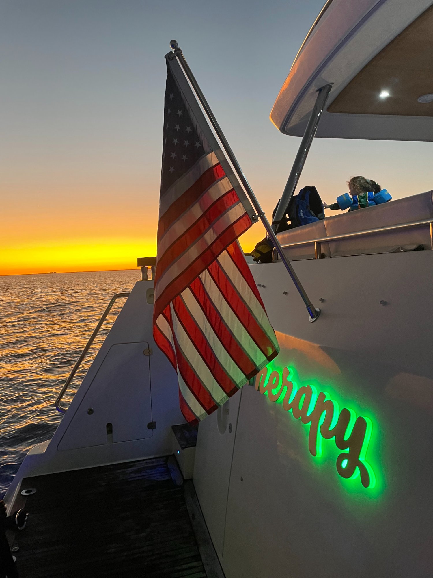 Aicon 75 Therapy sunset American flag Miami yacht charter