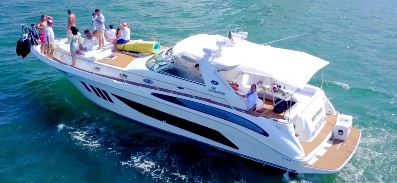 Group private yacht charter party Cancun Sea Ray 455 aerial drone